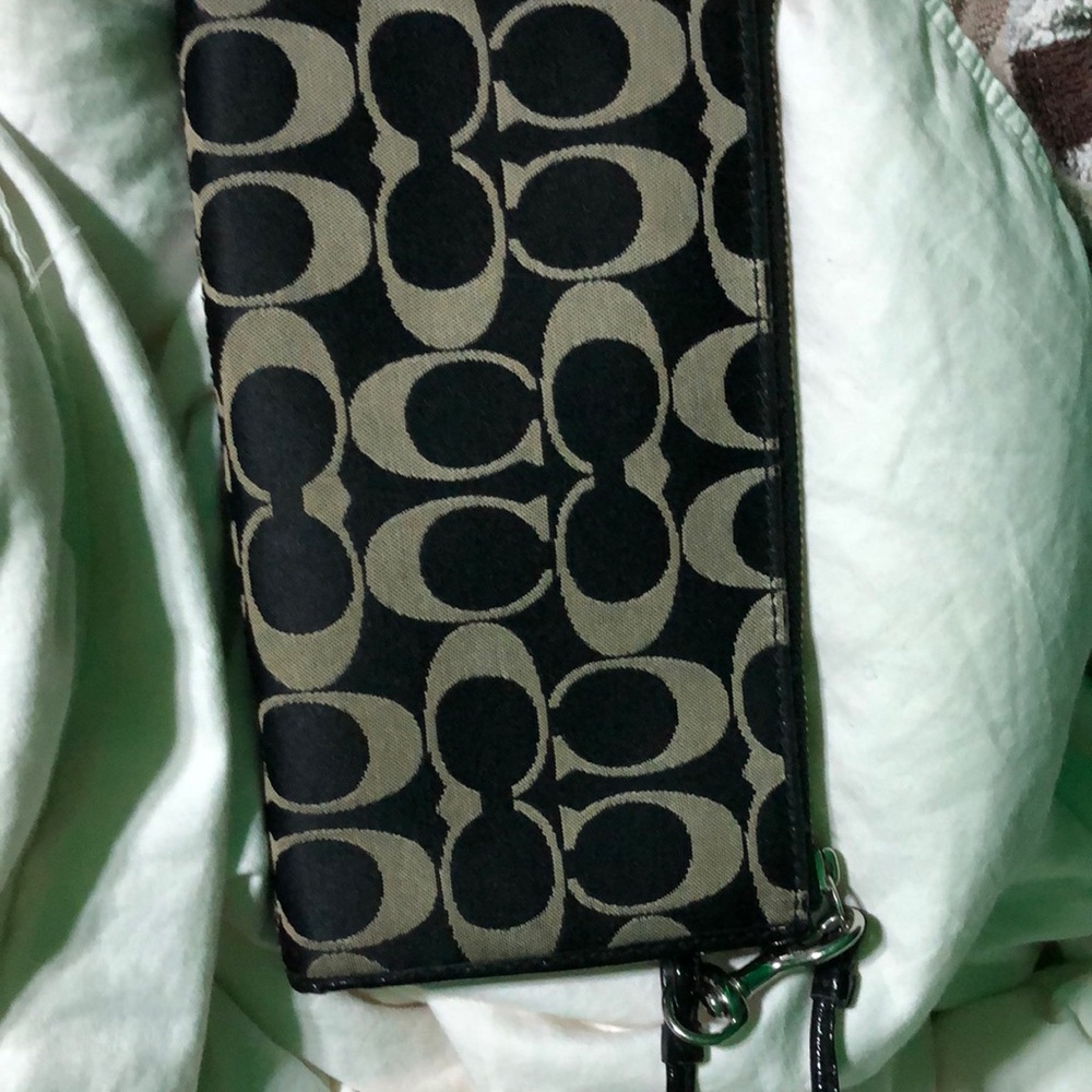 Coach wallet /card holder. 4 inches width and 9 inches long